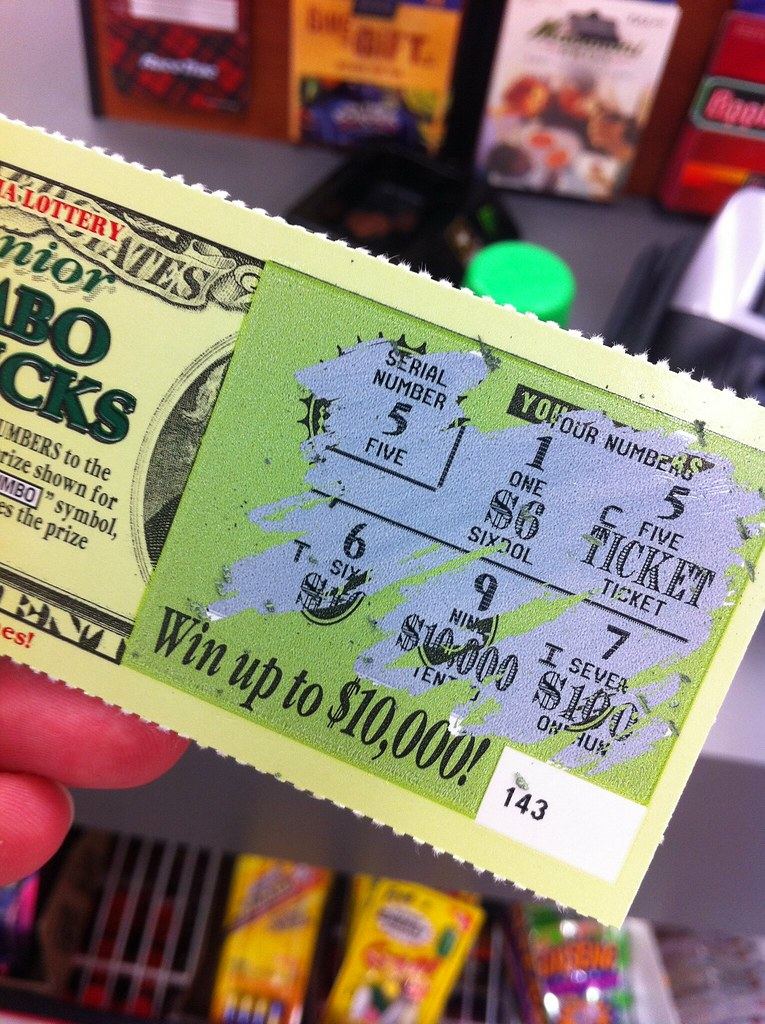 Scratch ticket in hand
